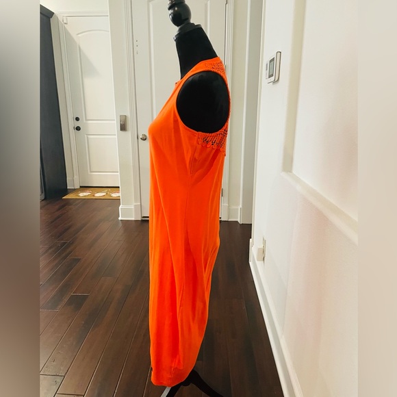 Orange sleeveless dress with crochet back. It’s a fitted dress - Picture 2 of 6